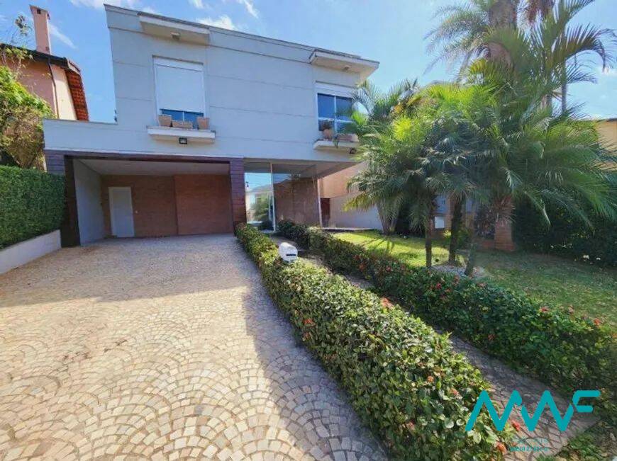 Casa de Condomínio à venda com 4 quartos, 422m² - Foto 1